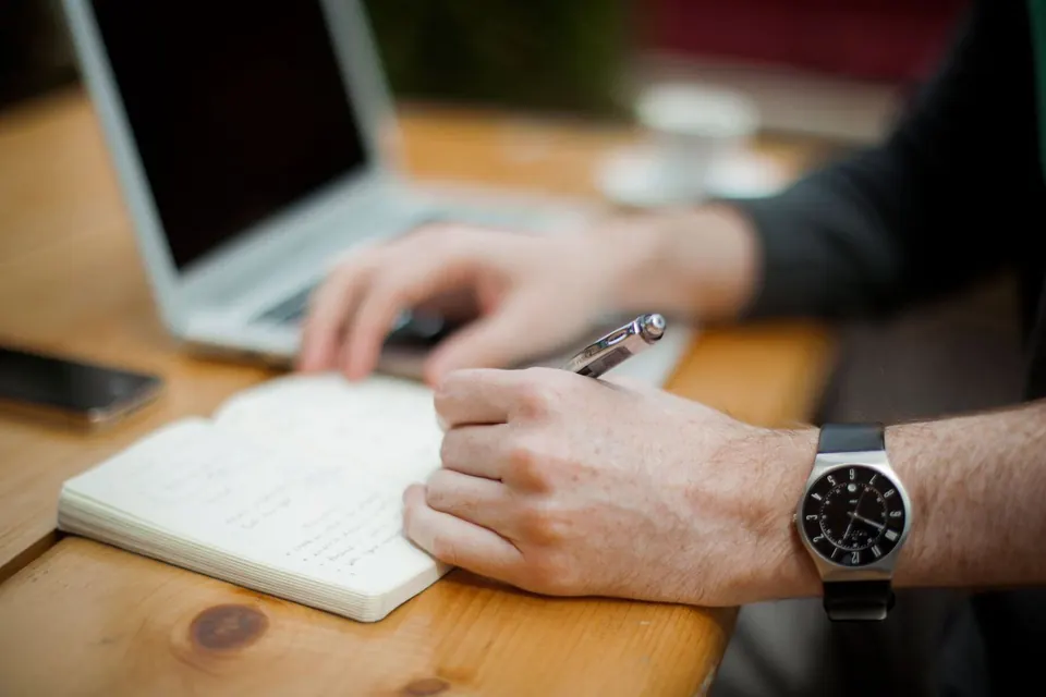 Laptop on a desk in a bright workspace